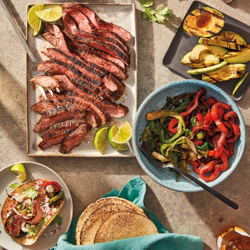 Grilled flank steak and avocado soft tacos