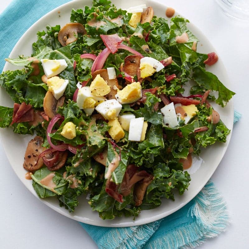 Kale salad with warm bacon dressing