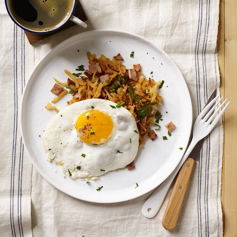 Jicama-ham hash browns with fried eggs